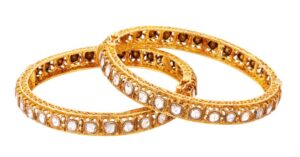 Stone-studded gold bangles