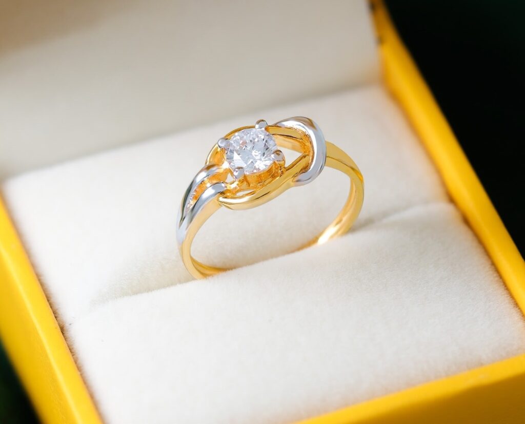 Solitaire Diamond Ring with Gold Accents
