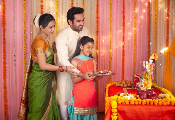 Family celebrating Janmashtami