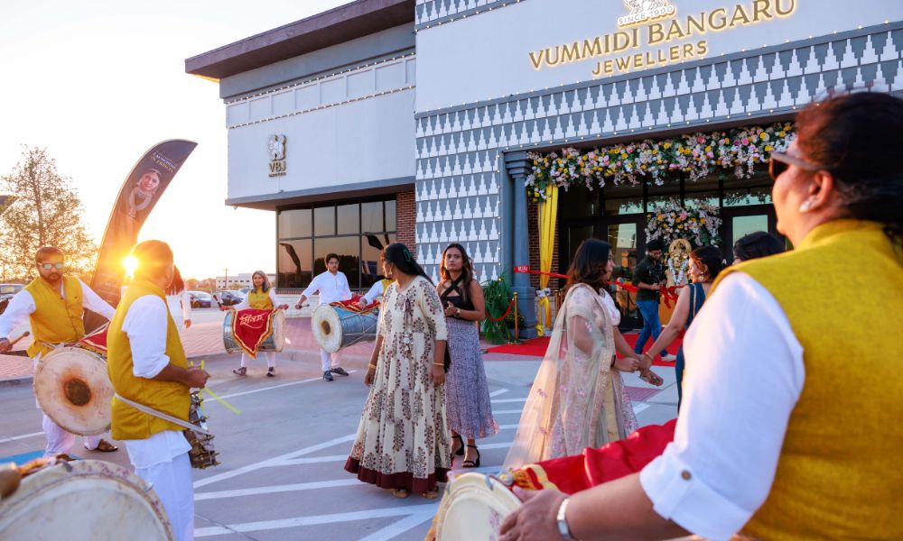 traditional drummers outside a VBJ store during an event